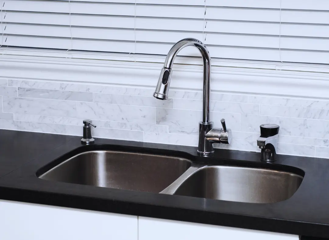 Changement Mitigeur d'évier Thue et Mue